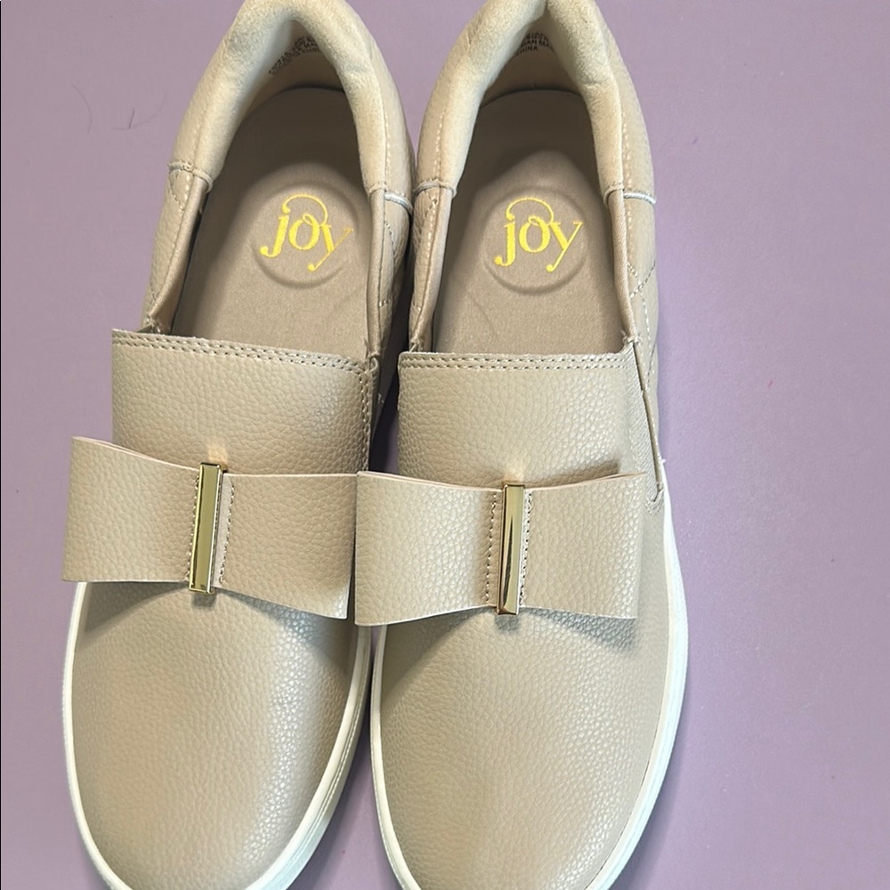 Shona Joy Tan Slip-On Sneakers with Bow Detail.